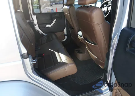 2011 Jeep Wrangler Unlimited Sahara из США, поврежденный, VIN 1J4HA5H19BL615748